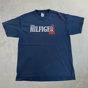 J- Vintage Tommy Hilfiger 1985 Text Graphic Tee - L