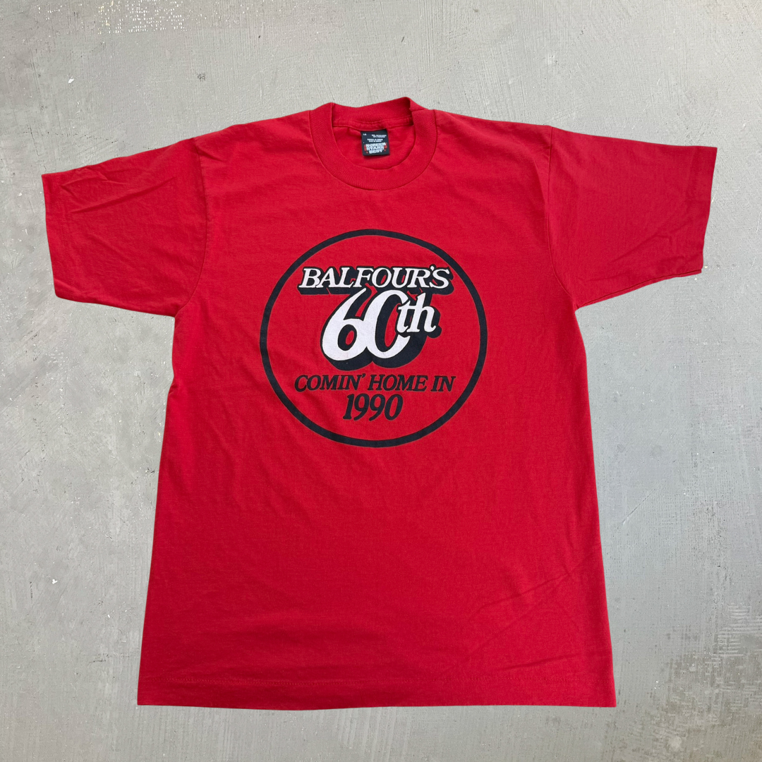 J- Vintage '90 Balfour's 60th Comin' Home In Text Graphic Single Stitch Tee - L