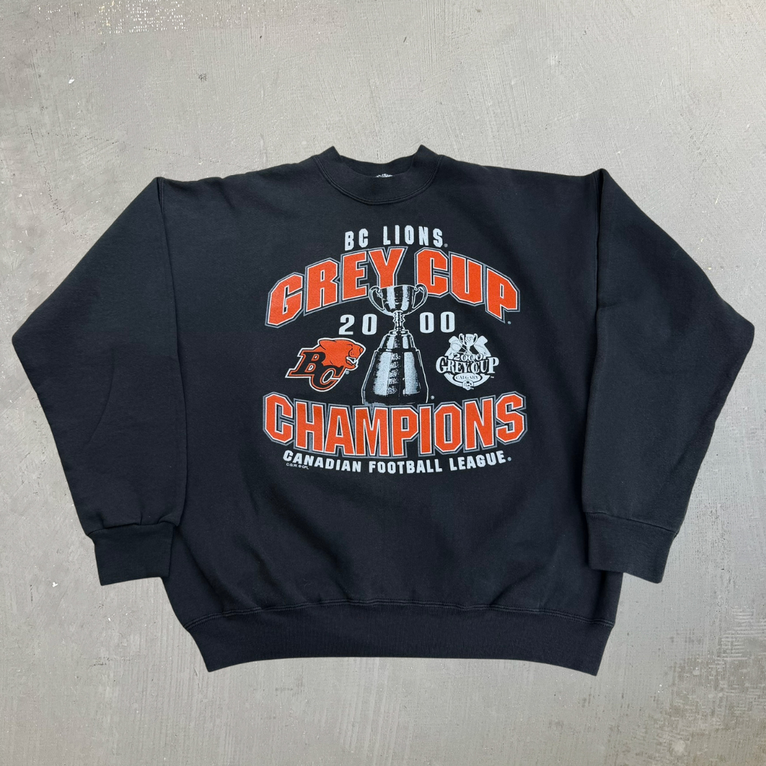 J- Vintage '00 BC Lions CFL Grey Cups Champions Graphic Crewneck - L