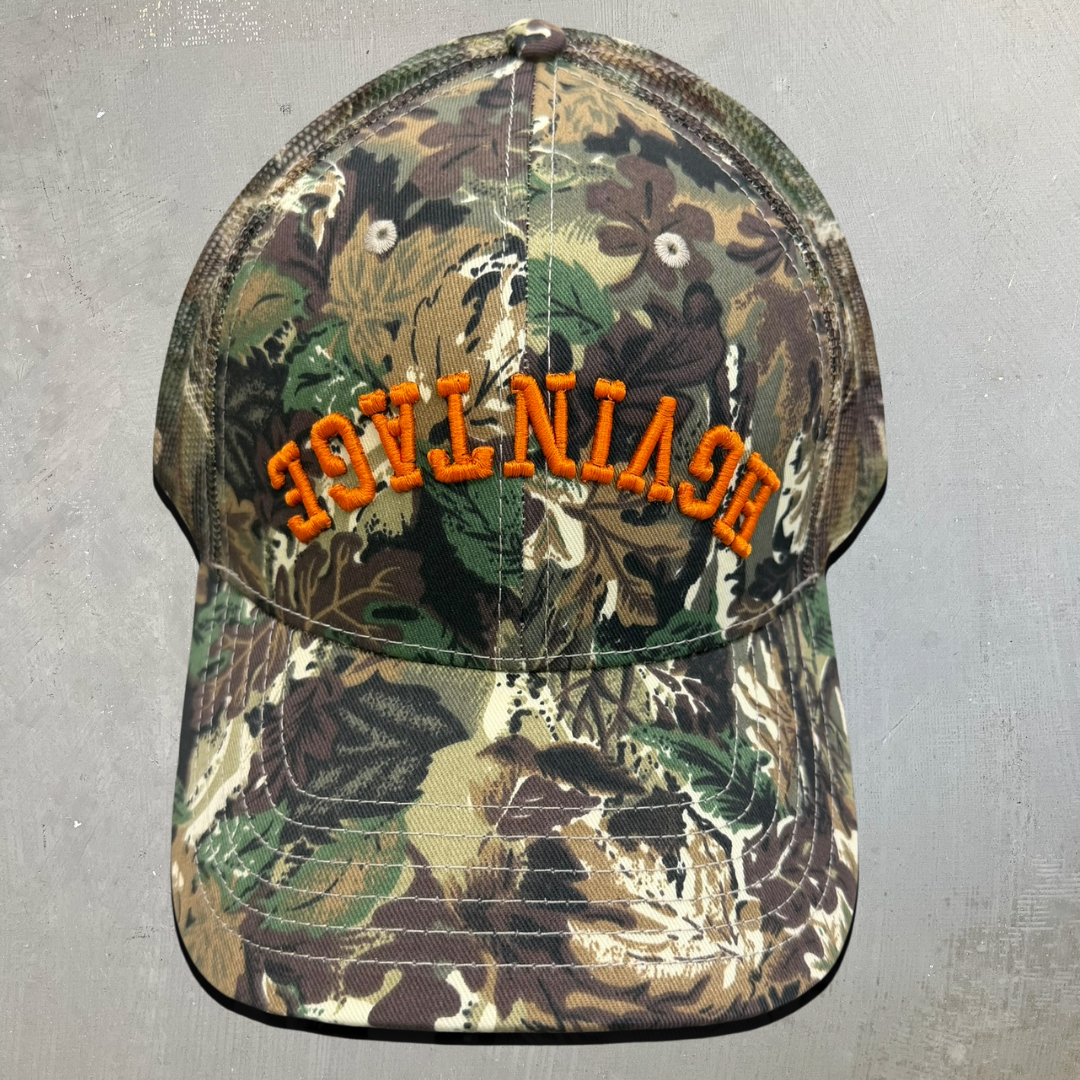 HGV Reverse Logo Camo Mesh Trucker Hat