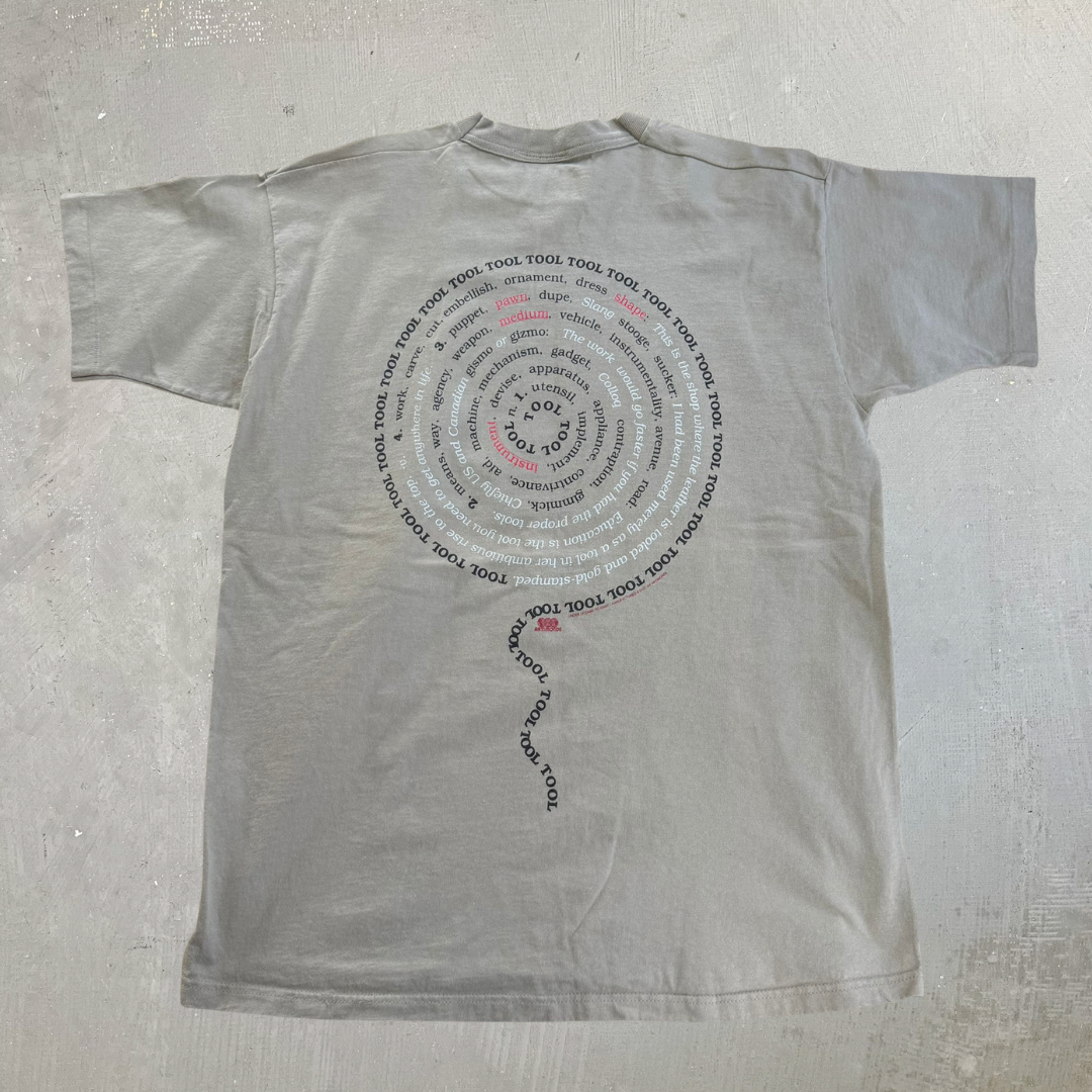 J- Vintage 90s Tool Tan Dictionary Spiral Text Artimonde Tag Single Stitch Tee - L