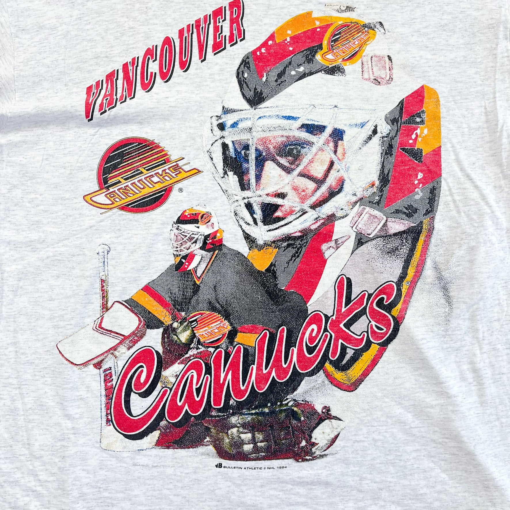 F- Vintage '94 Vancouver Canucks NHL Text & Goalie Picture Single Stitch Game