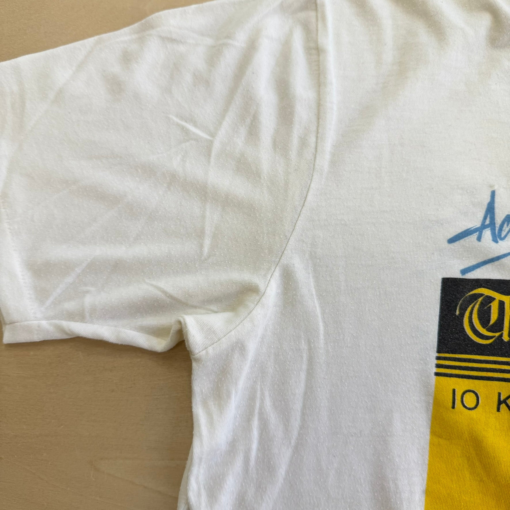 J- Vintage '89 Nike Vancouver Sun Run 10KM Graphic Single Stitch Tee - L