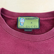 J- Bootleg Gucci Doraemon Text & Embroidered Graphic Crewneck - M