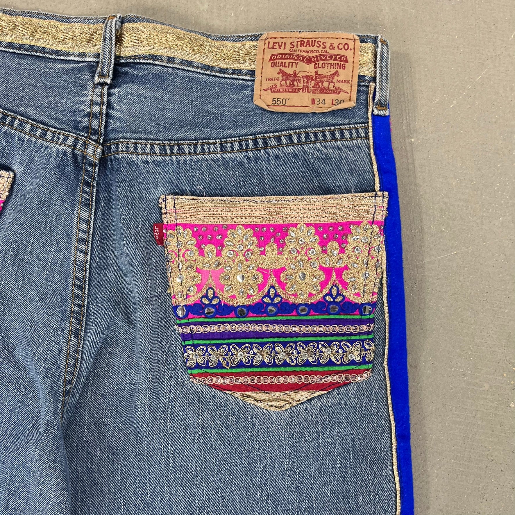 F- HOM Hand Beaded Levi's 550 Reworked Custom Jeans