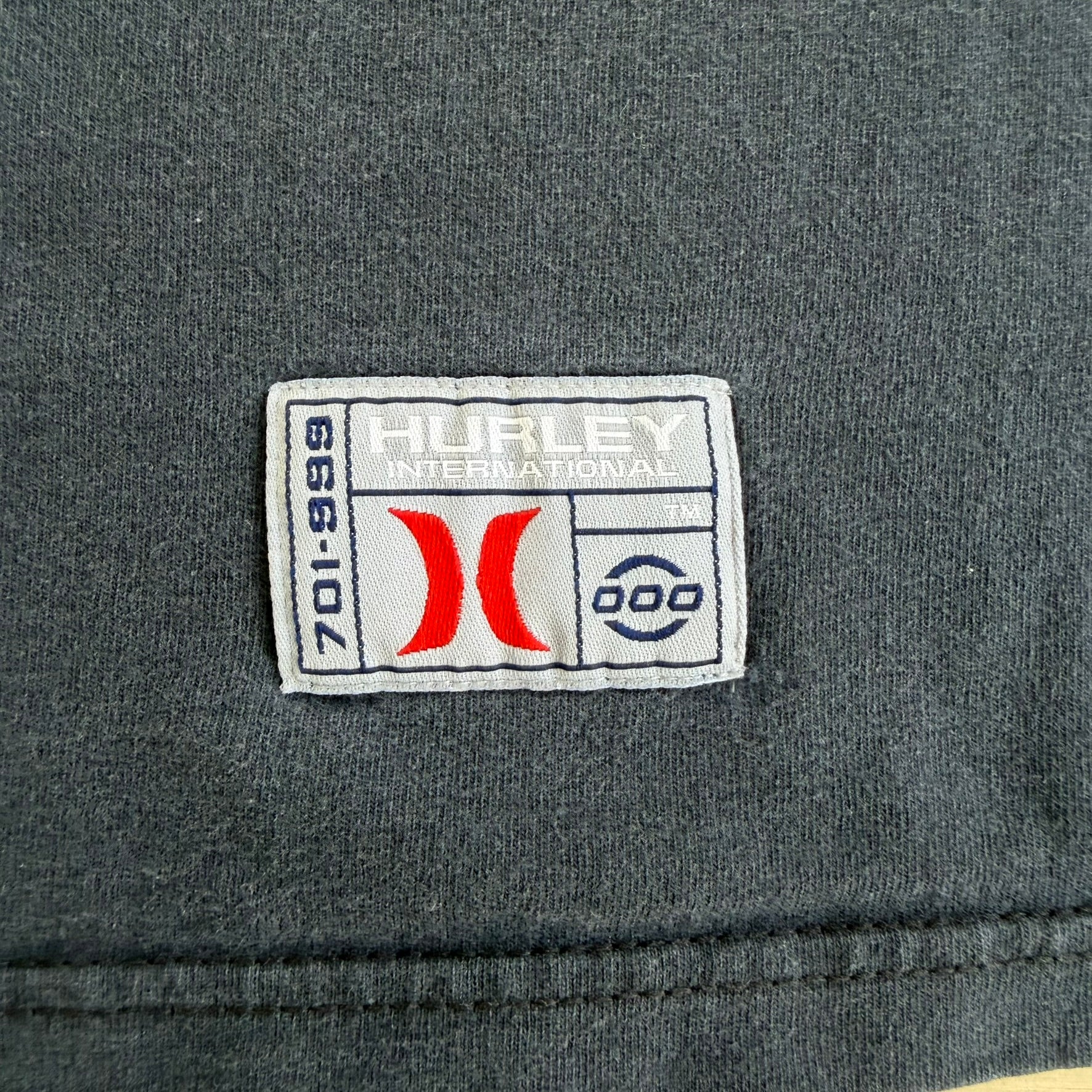 J- Vintage Hurley International The Movement Is On Graphic Text Made In USA Tee - XL