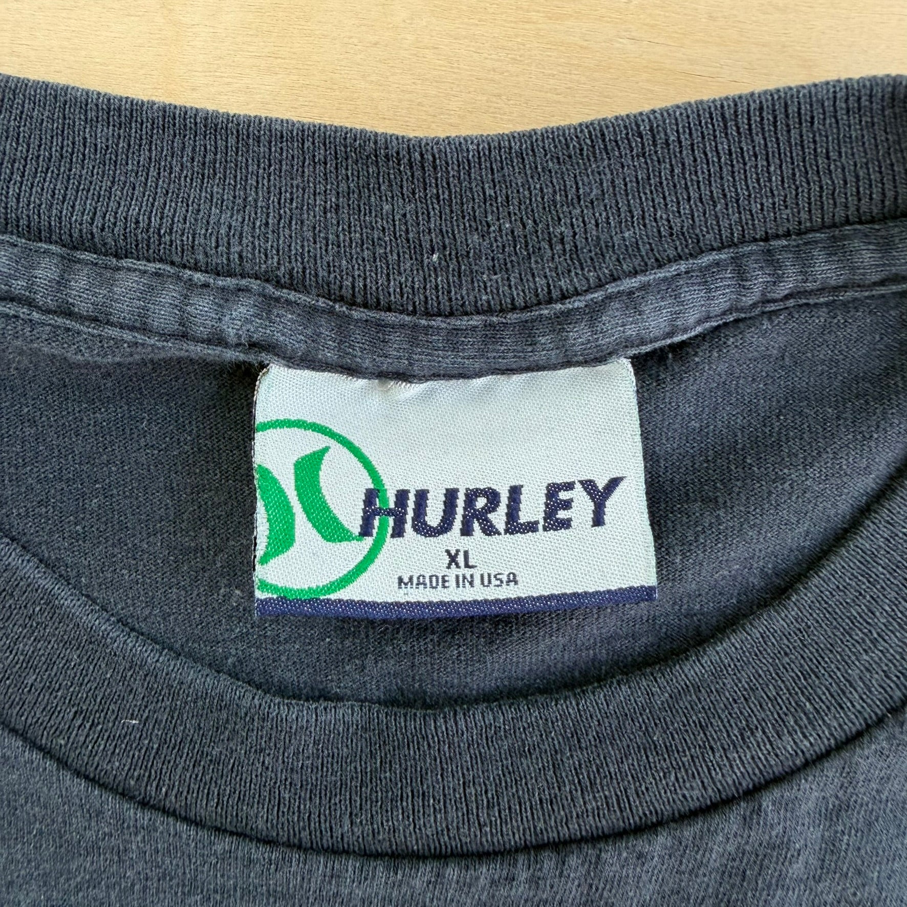 J- Vintage Hurley International The Movement Is On Graphic Text Made In USA Tee - XL