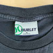 J- Vintage Hurley International The Movement Is On Graphic Text Made In USA Tee - XL