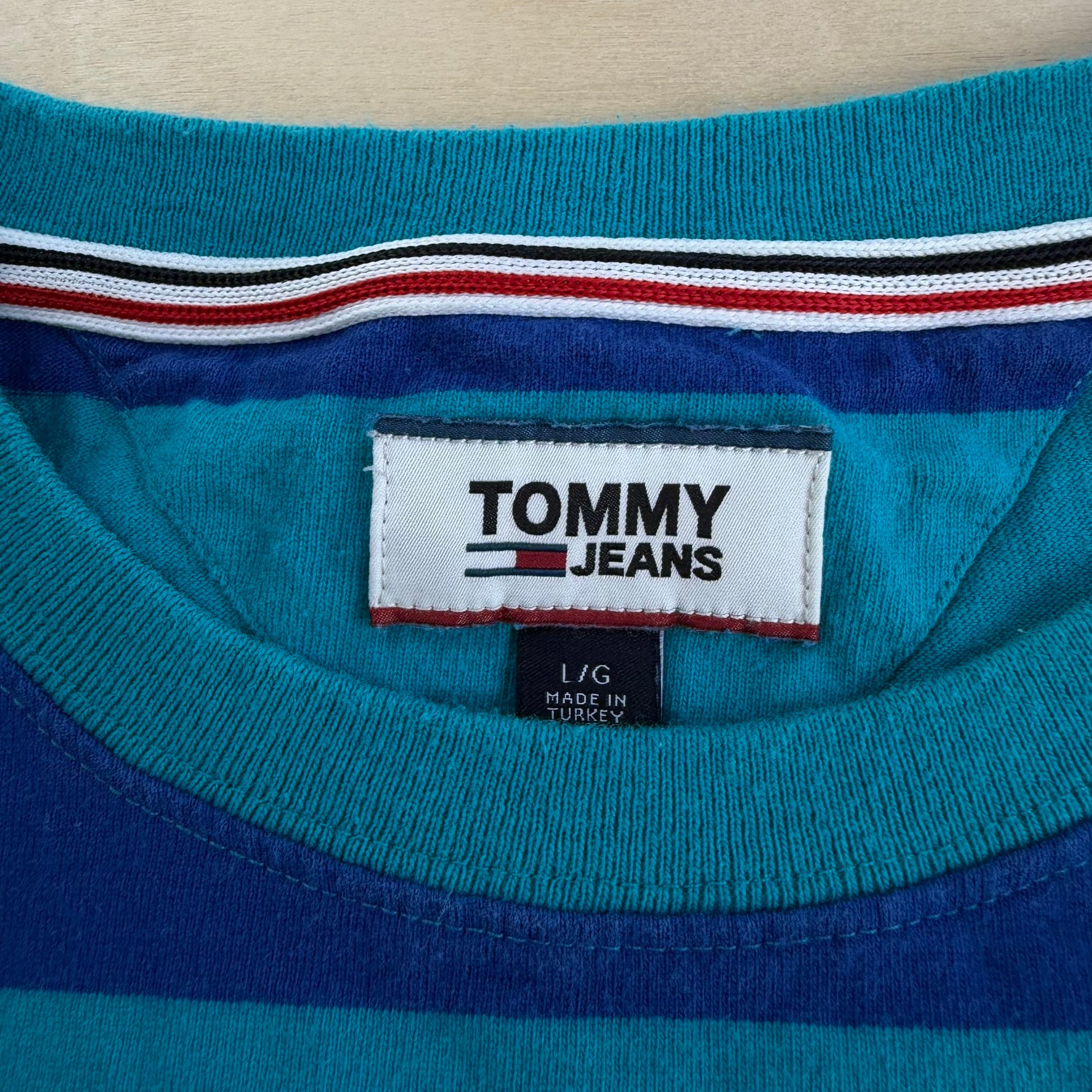 J- Vintage Tommy Jeans Embroidered Text Blue/Teal Striped Tee - L