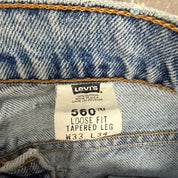 J- Vintage Levi's 560 Orange Tab Made In USA Loose Fit Tapered Legs Jeans - 33x34