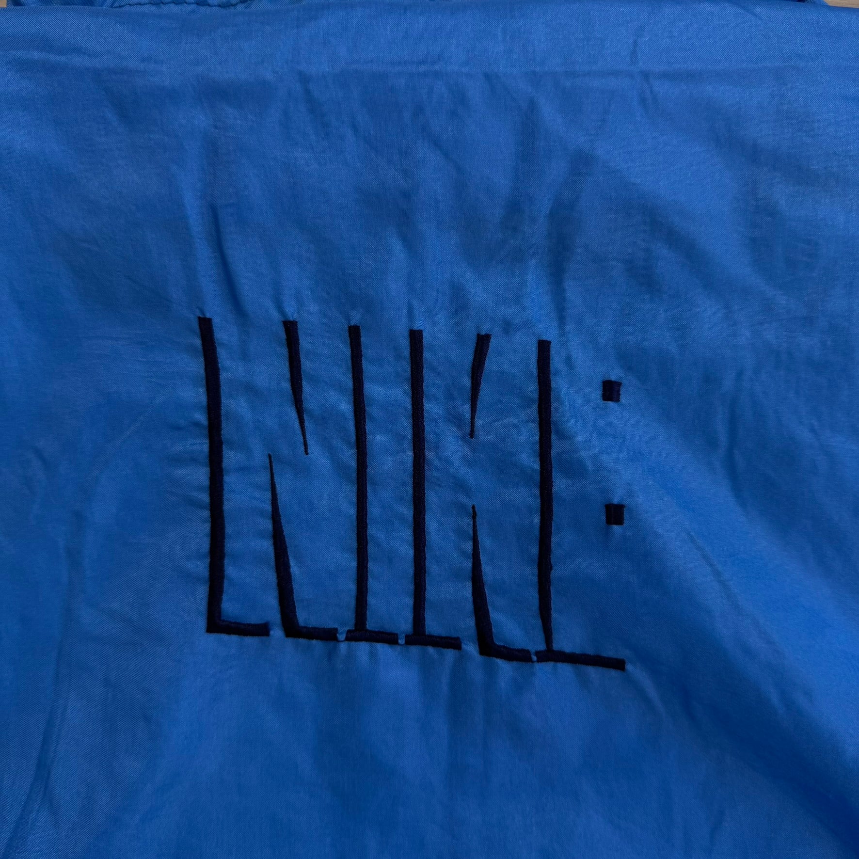 J- Vintage 90s Nike Embroidered Swoosh & Text Light Blue Zip Up Lightweight Jacket - L