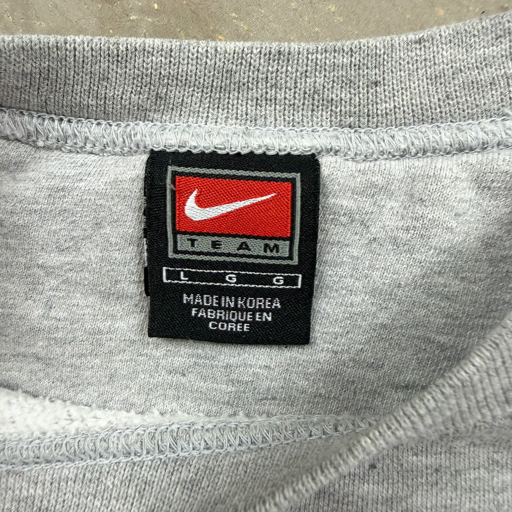 F- Nike Team Mississippi State University Embroidered Text Crewneck